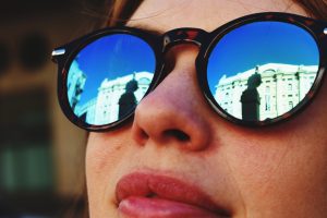 close up woman wearing sunglasses city