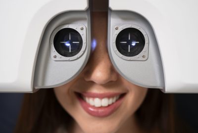 front-view-woman-getting-her-eyes-checked