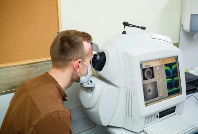 Professional medical equipment scanning the patient's eyes. The device of a modern healthcare clinic.