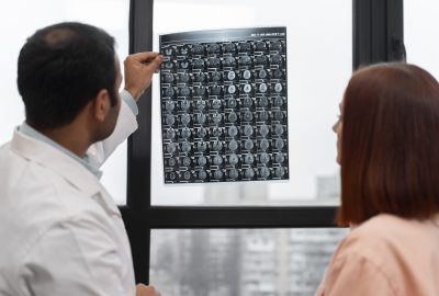 side-view-doctor-holding-radiography